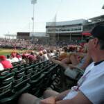 A PICTURE OF WARREN TAKING IN THE GAME, AND THE SCENERY TO HIS RIGHT! RIGHT!!