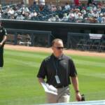 HERE IS THE GENERAL MANAGER OF THE CLEVELAND INDIANS, MARK SHAPIRO, HEADING TO THE INDIANS DUGOUT IN PEORIA. IT'S A TOUGH JOB, BUT SOMEBODY HAS TO DO IT!!!