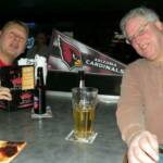 I went out Saturday afternoon all over town trying to find Cardinals gear. All I could find was the pennant that we taped to the railing. Here are Drumstir and Dougie giving it there all. Go Cards!