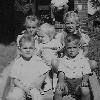 This is a picture of (Clockwise from left in foreground) LYNDA CINCER FERRELL, BUZZ CINCURAK (Baby) JEANNIE NERVO SHIMKO, BOB NERVO, AND WAYNE. Not sure where or when this was taken. 