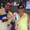 Two bartenders from the bar behind the Hyatt in Bonita Springs pouring Party JoeBo a drink. 