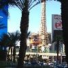 Here is a shot I took from
a distance of The Paris 
Hotel Casino. With the palm tree in foreground I think it looks like a Postcard.